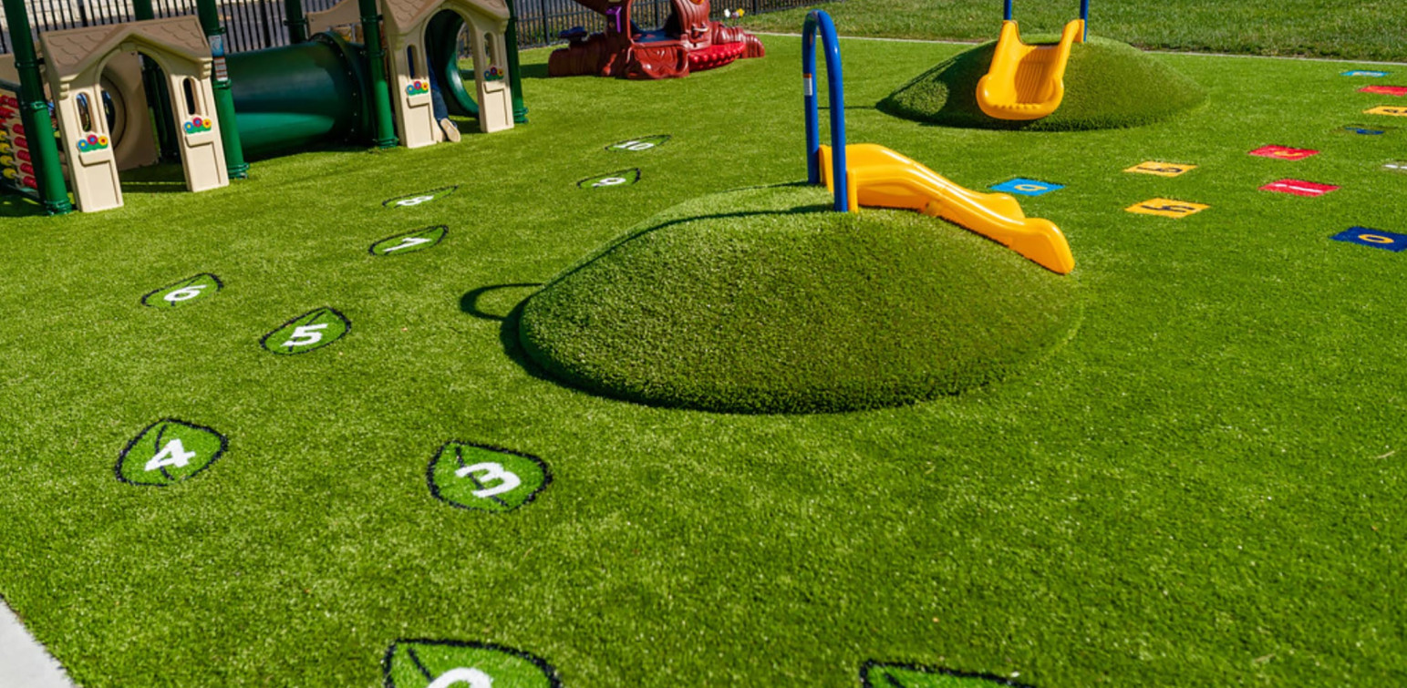 ForeverLawn Eastern South Dakota Artificial Grass Playground Grass Mounds and Funserts Project